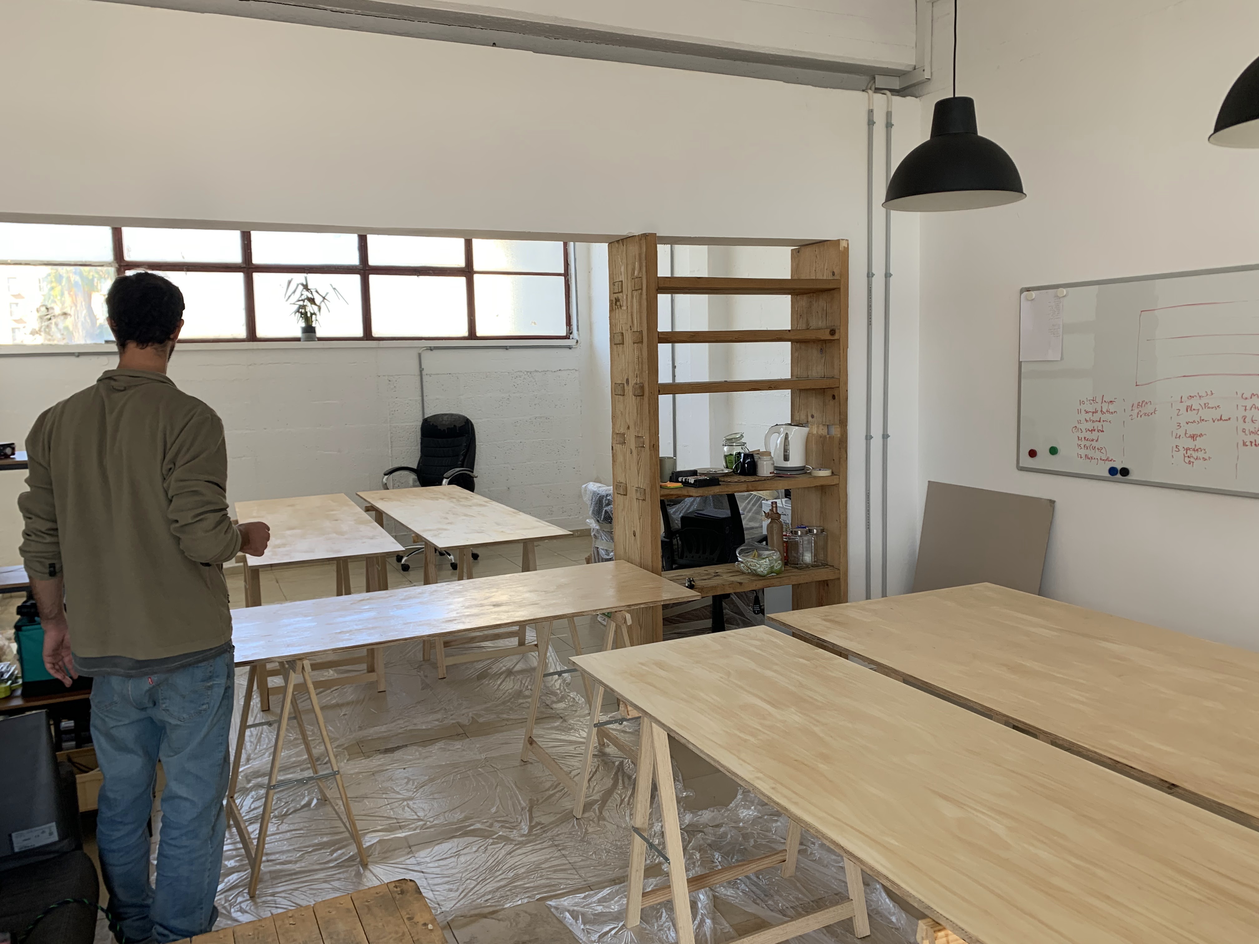 Office with speakers and whiteboards